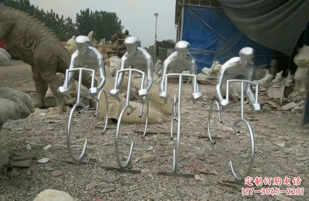 湖南不锈钢广场抽象骑自行车人物雕塑