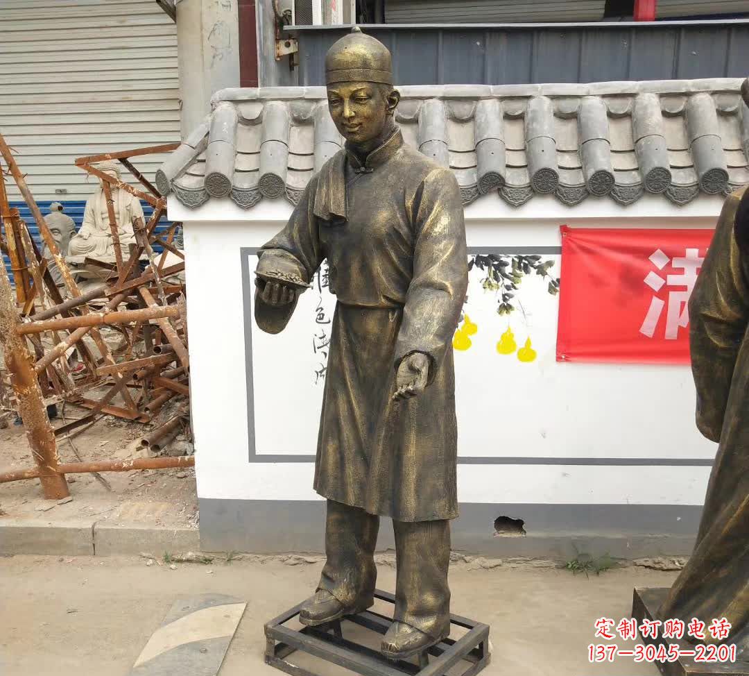 湖南传承百年店小二铜雕