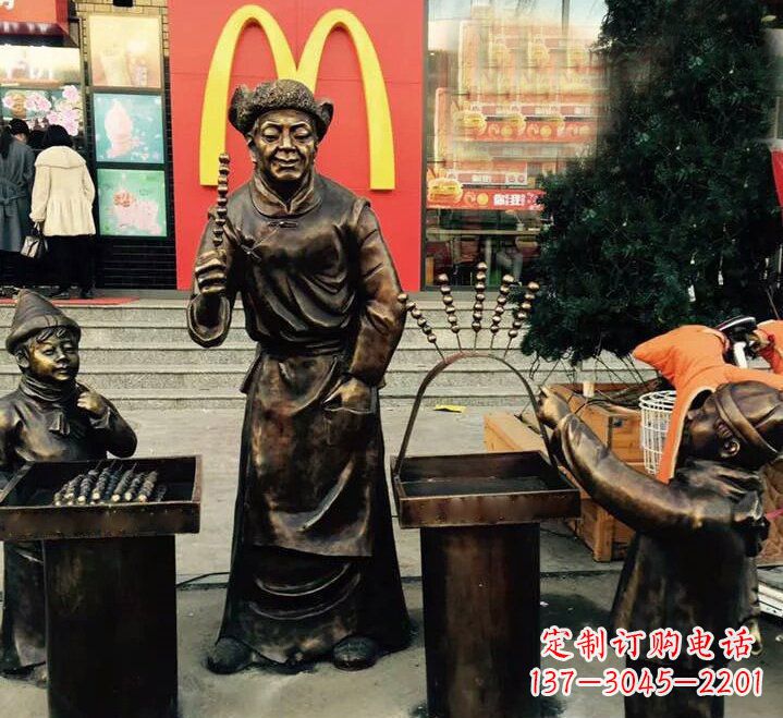 湖南步行街卖糖葫芦的人物铜雕