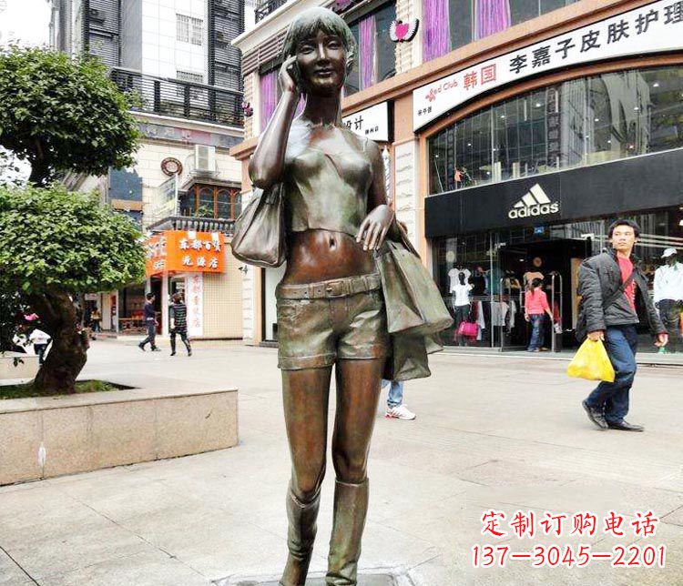 湖南打电话逛街的女孩铜雕