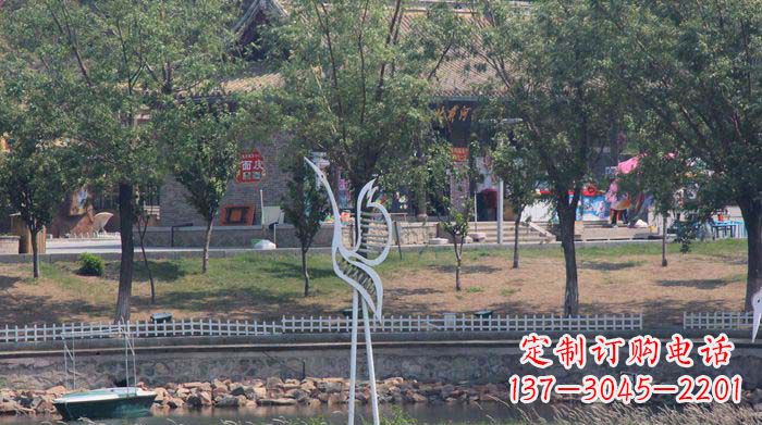 湖南融合瑞雪灵羽,灵灯晶莹不锈钢仙鹤雕塑