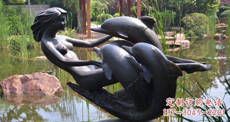 湖南公园海豚和女孩景观铜雕