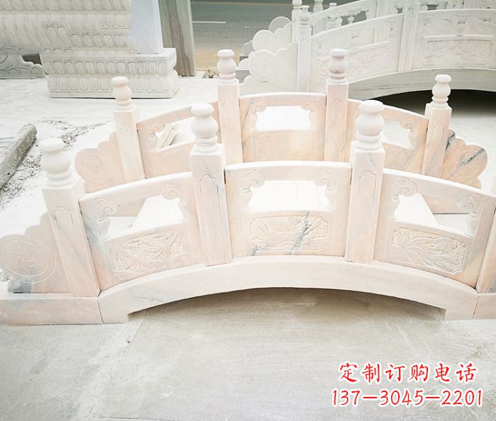 湖南公园景观晚霞红石雕拱桥