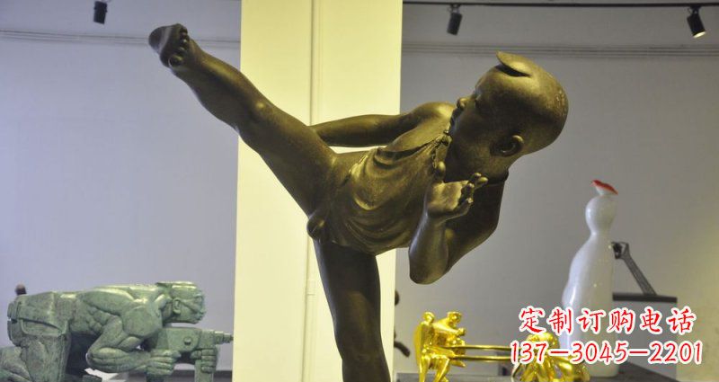 湖南领雕塑男孩练功夫铜雕