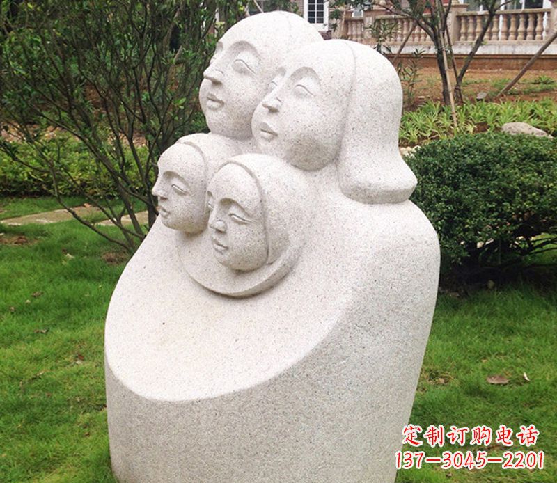 湖南公园母子人头像石雕