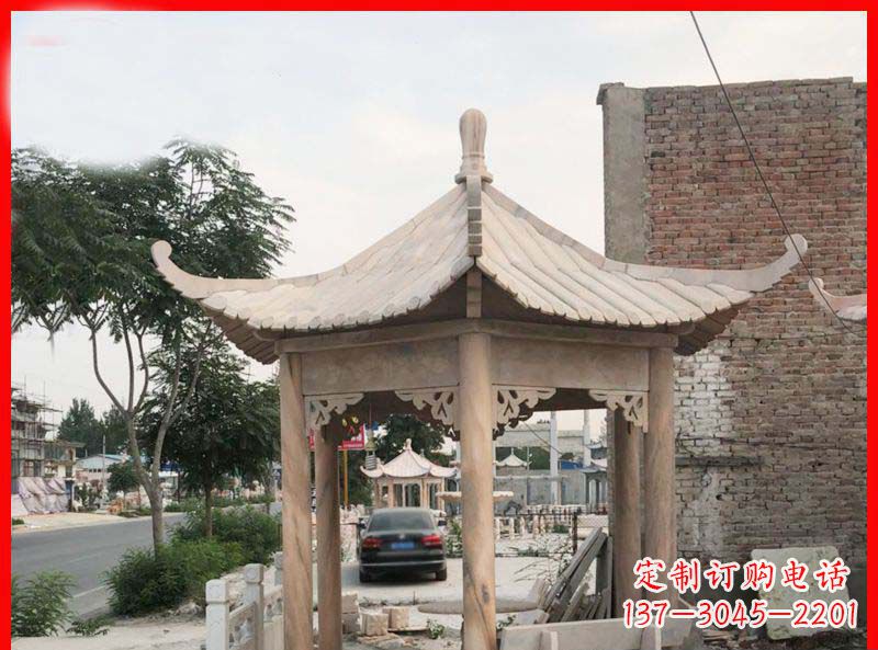湖南公园晚霞红六角石凉亭雕塑