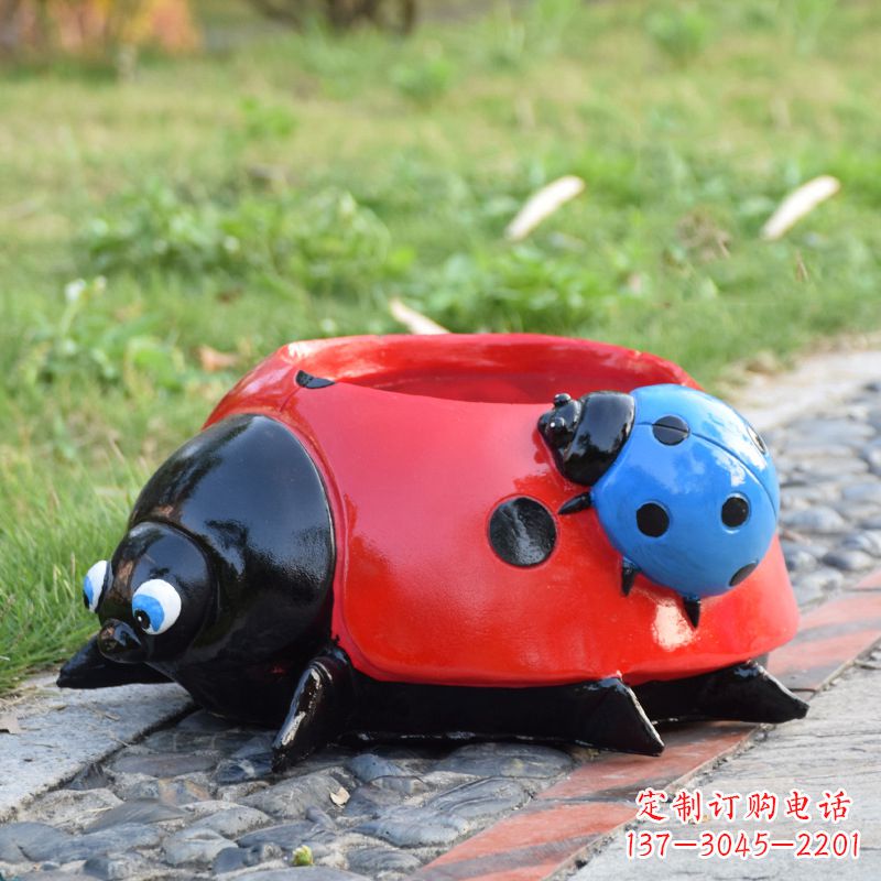 湖南红色玻璃钢七星瓢虫花盆雕塑