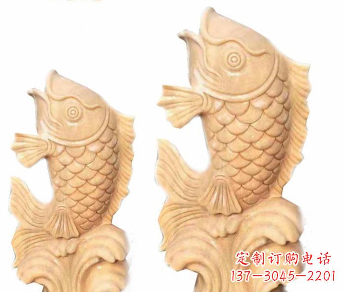 湖南晚霞红石喷水鲤鱼雕塑,灵动悠扬