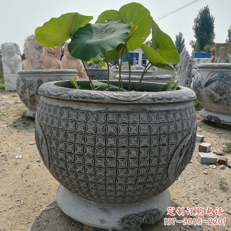湖南荷花鱼石雕塑,精美雕塑展现浪漫情怀