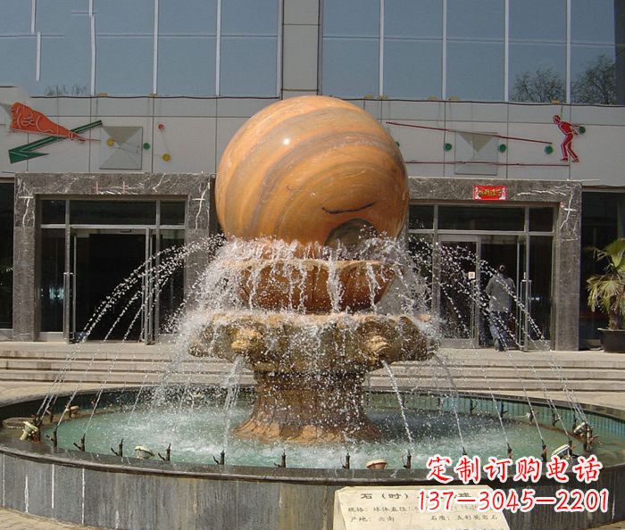 湖南石来运转球晚霞红风水球石雕