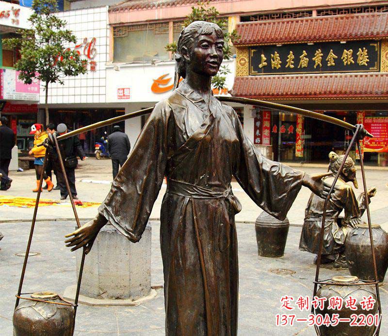 湖南挑着罐子的古代女人铜雕