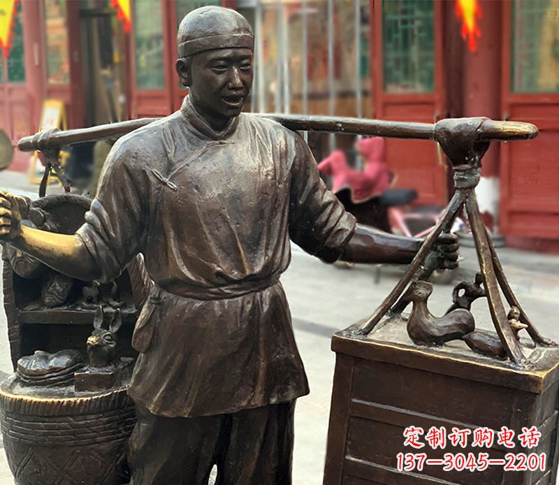 湖南铜雕步行街卖货郎人物雕塑
