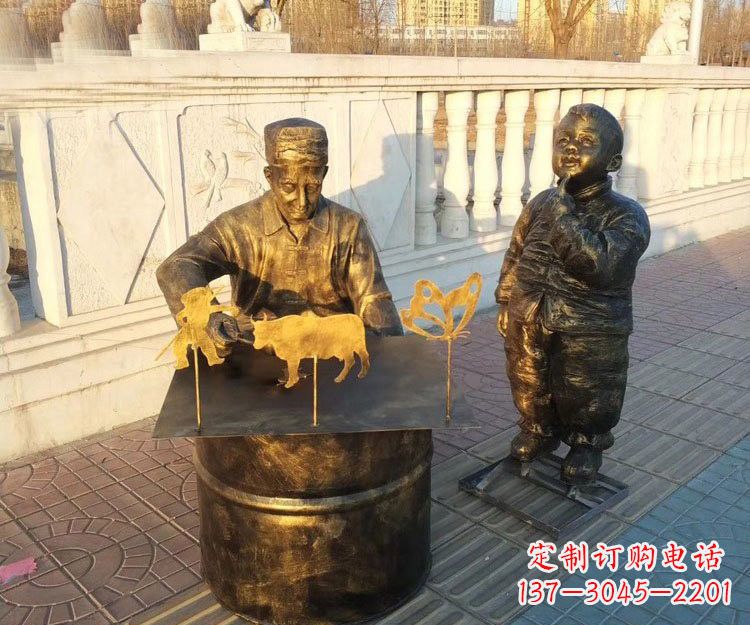 湖南铜雕画糖人的人物