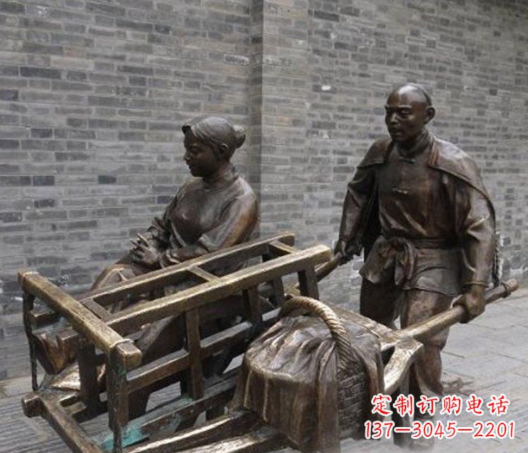 湖南推独轮车的人物铜雕