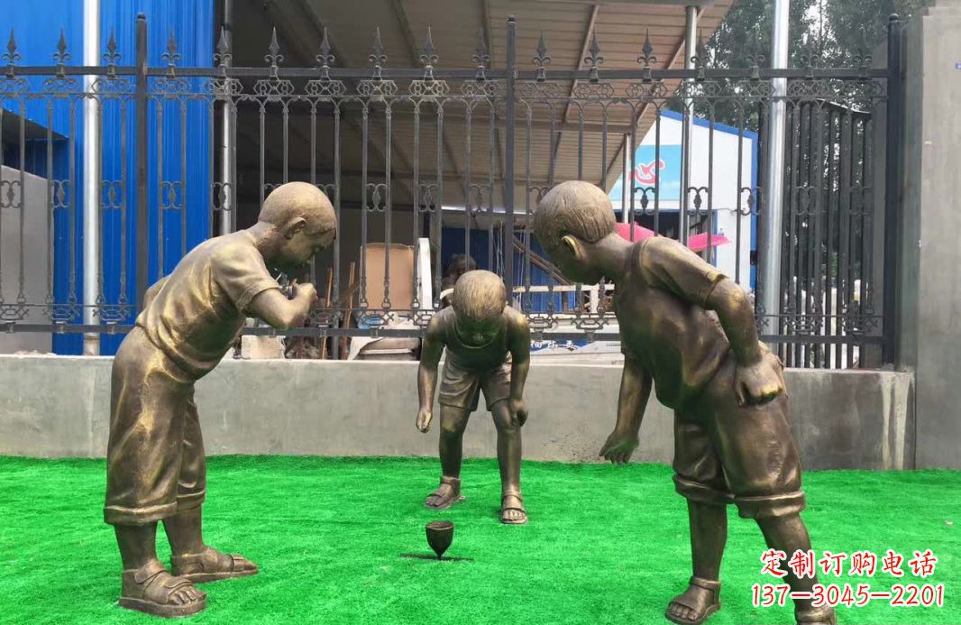湖南玩陀螺儿童铜雕塑