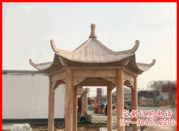 湖南晚霞红公园六角石雕凉亭