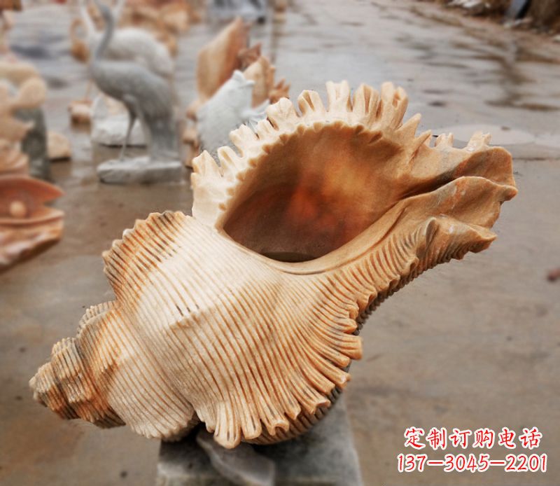 湖南晚霞红海螺石雕广场景观雕塑