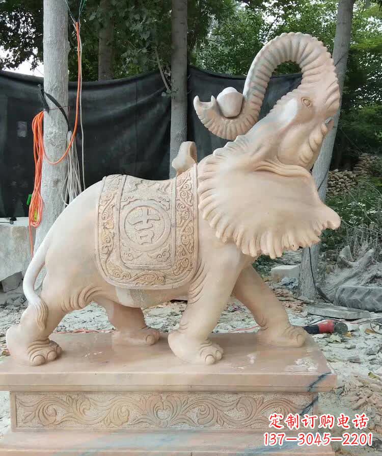 湖南晚霞红卷元宝大象雕塑