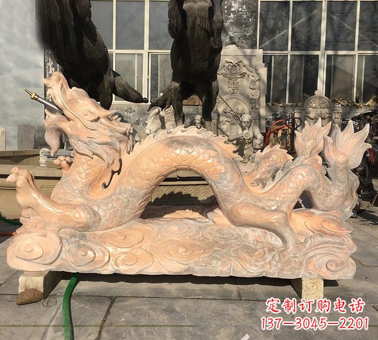 湖南晚霞红石雕喷水龙
