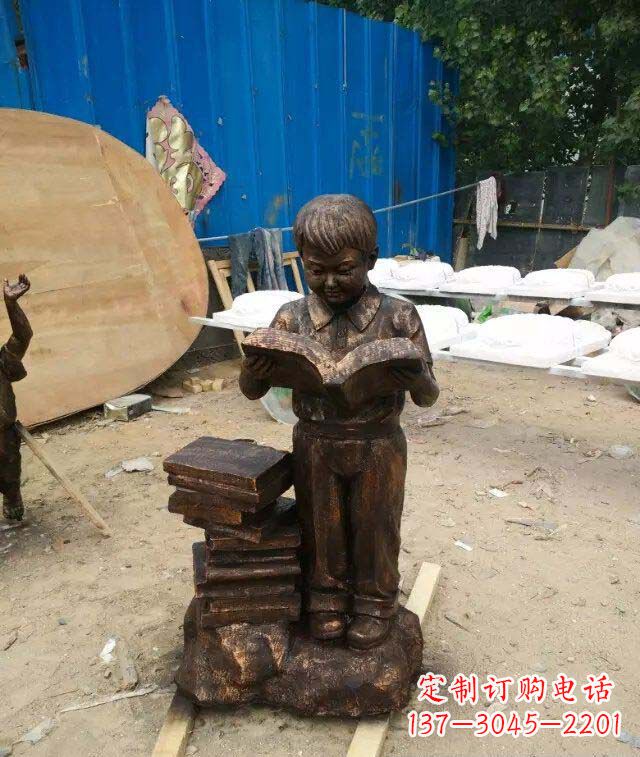 湖南小孩看书玻璃钢仿铜人物雕塑
