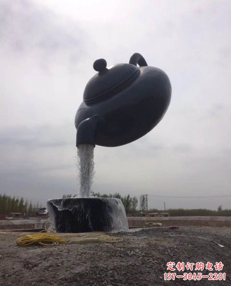 湖南新疆流水的茶壶铜雕