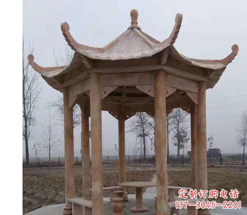 湖南公园晚霞红八角石雕凉亭